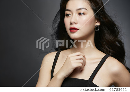 Dress portrait on black background 61783631