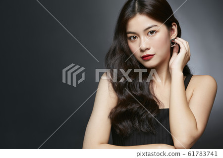 Dress portrait on black background 61783741