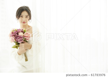 Portrait of woman in prom dress Portrait of woman in prom dress 61783976