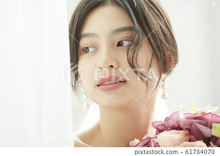 Portrait of woman in prom dress Portrait of woman in prom dress 61784070