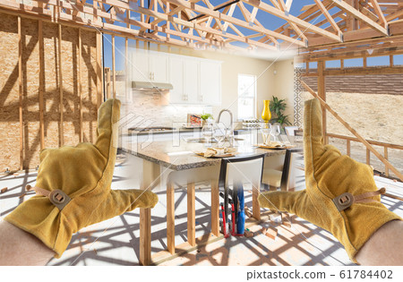 Male Contractor Hands Framing Completed Section of Construction Male Contractor Hands Framing Completed Section of Construction 61784402