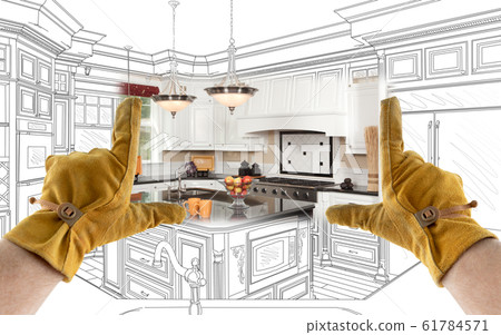 Male Contractor Hands Framing Completed Section of Sketch Blueprints 61784571