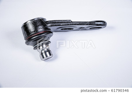 New spare parts spherical ball joints of a suspension bracket of a car on a gray background 61790346