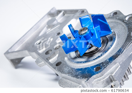 New metal automobile pump for cooling the engine of a water pump on a gray background. The concept of new spare parts for the car engine 61790634