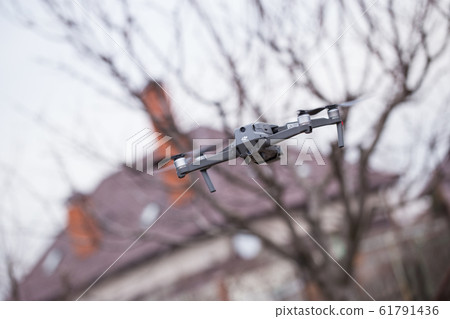 Dji Mavic 2 pro hovering in the air during the daytime Dji Mavic 2 pro hovering in the air during the daytime 61791436