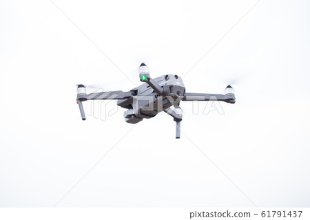 Dji Mavic 2 pro hovering in the air during the daytime Dji Mavic 2 pro hovering in the air during the daytime 61791437