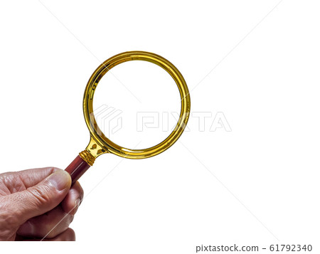 Material holding a magnifying glass in hand 61792340