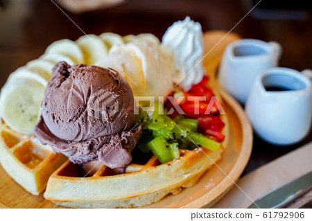 dessert made of brownie and green tea ice cream 61792906