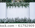 backdrop with blank logo decorated with white 61792909