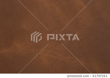 Old brown leather texture. Can be used as background in art or design projects. Old brown leather texture. Can be used as background in art or design projects. 61797261