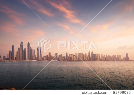 skyscrapers in Dubai Marina, sunset time, UAE skyscrapers in Dubai Marina, sunset time, UAE 61799083