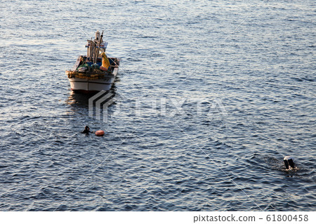 Fishing boat and haen Fishing boat and haen 61800458