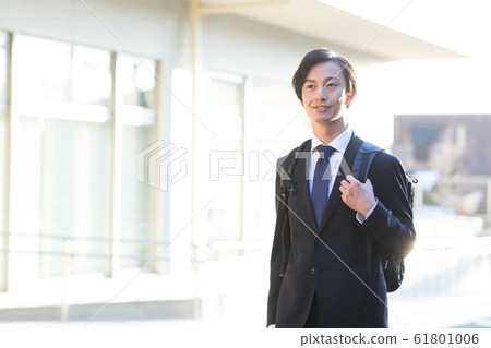A young man in a suit A young man in a suit 61801006