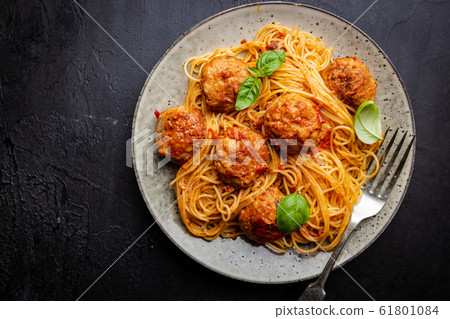 Plate of spaghetti with meatballs Plate of spaghetti with meatballs 61801084
