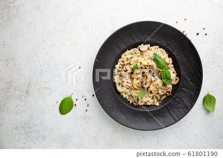 Risotto with mushrooms in a plate 61801190