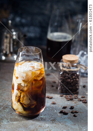 Ice coffee in a tall glasses Ice coffee in a tall glasses 61801473