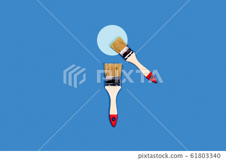 Brushes on a blue background. 61803340