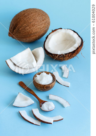 Coconut oil in a bowl with a spoon Coconut oil in a bowl with a spoon 61804029