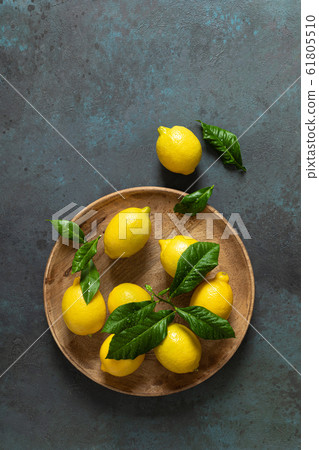 Fresh lemons with leaves, summer citrus lemonade Fresh lemons with leaves, summer citrus lemonade 61805510