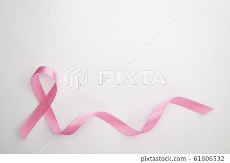 Pink ribbon on white background Pink ribbon on white background 61806532