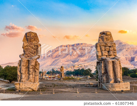 Sunrise over Colossi 61807346