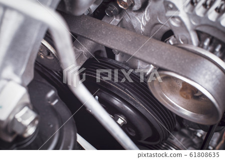 Timing belt and pulley deteriorate in engine system. 61808635
