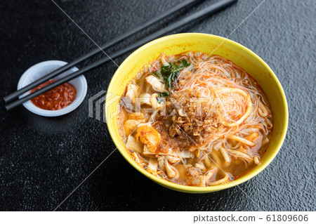 Bowl of Penang prawn mee, popular noodle in 61809606