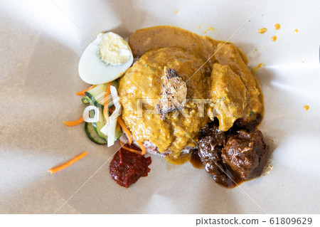 Nasi Dagang, popular traditional rice in Nasi Dagang, popular traditional rice in 61809629