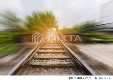 railway bridge with motion blur effect over the canal - railroad landscape 61809724