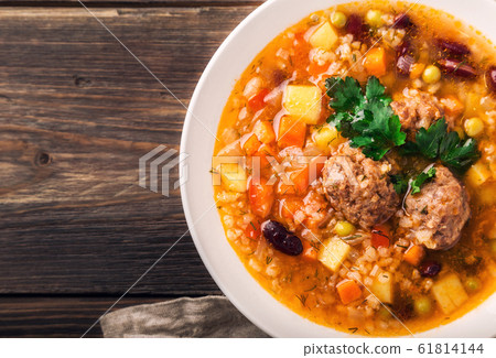 Homemade vegetable soup with meatballs Homemade vegetable soup with meatballs 61814144
