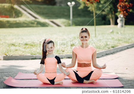 Sports family in a summer park 61814206