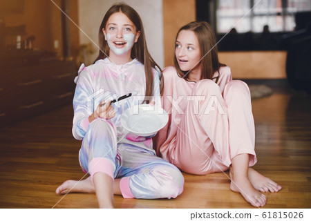 Two little girls in a cute pajamas Two little girls in a cute pajamas 61815026