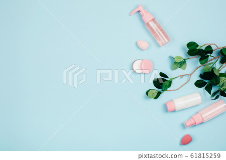 Care cosmetics on green background Care cosmetics on green background 61815259