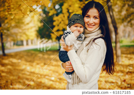 Family with little son in a autumn park 61817185