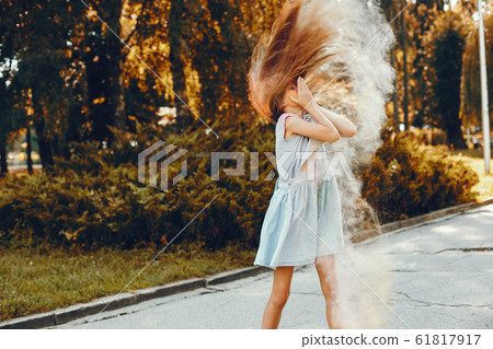Cute girl have fun in a summer park 61817917