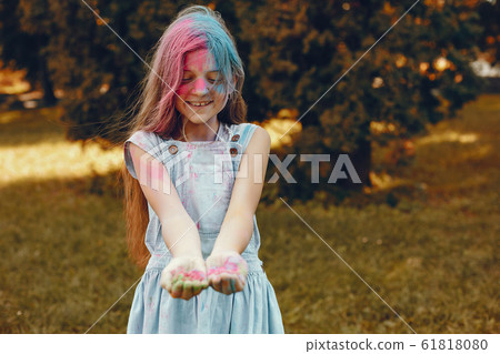Cute girl have fun in a summer park 61818080