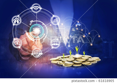 Startup button on a virtual screen touched by a Startup button on a virtual screen touched by a 61818905