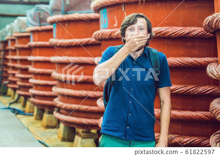 The man shows how stinks fish sauce on Phu Quoc, Vietnam 61822597