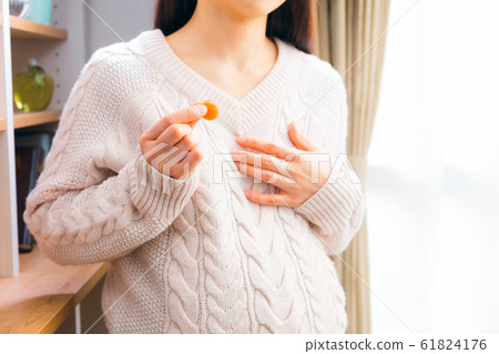 Pregnant woman, candy, drooling sickness, eating sickness Pregnant woman, candy, drooling sickness, eating sickness 61824176