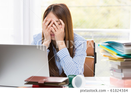 Business woman covering face Business woman covering face 61824384