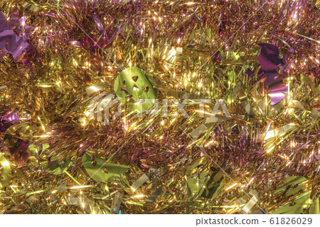 Pink and golden Halloween wreath background with sparkling pumpkin and bats 61826029