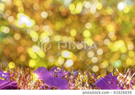 Pink and golden Halloween wreath background with sparkling pumpkin and bats 61826036