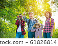 Happy asian family trekking in forest together on vacation 61826814