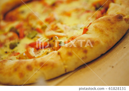 pizza with tomatoes, olives and cheese close up. fast food advertising, confectionery, cooking, overeating, diet, Italian food pizza with tomatoes, olives and cheese close up. fast food advertising, confectionery, cooking, overeating, diet, Italian food 61828131