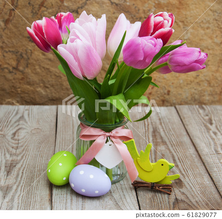 Easter eggs and tulips 61829077