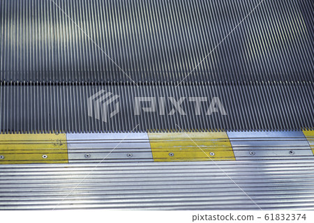 going up a shiny metal staircase, escalator, empty, finished with blue tine going up a shiny metal staircase, escalator, empty, finished with blue tine 61832374