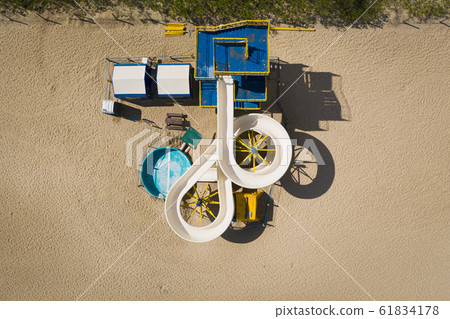 Top down view on water slide renovation between 61834178