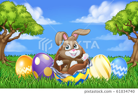 Easter Bunny Rabbit Breaking Chocolate Egg Scene Easter Bunny Rabbit Breaking Chocolate Egg Scene 61834740