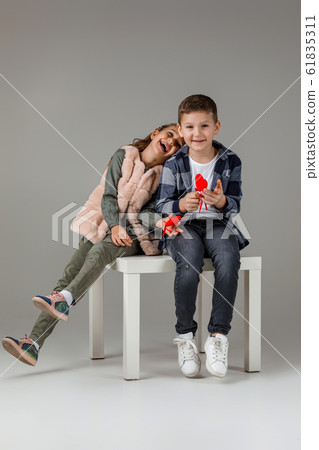 couple child girl and boy in fashionable clothes couple child girl and boy in fashionable clothes 61835311