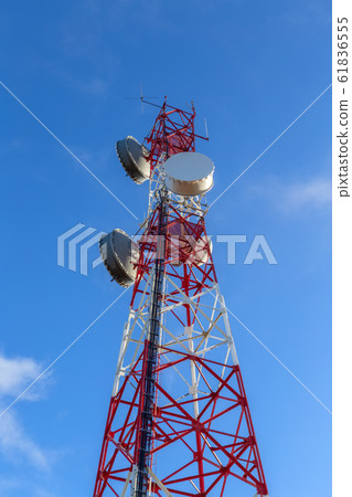 A modern tower antenna for broadcasting telephone, television, and Internet signals. Against the sky. A modern tower antenna for broadcasting telephone, television, and Internet signals. Against the sky. 61836555